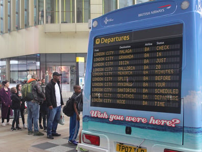 An ice cream truck for British Airways with a 'departures' decoration