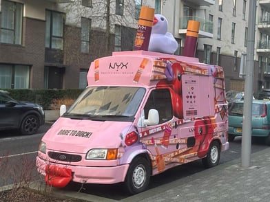 The NYX ice cream van on the road, heading to a media outlet.