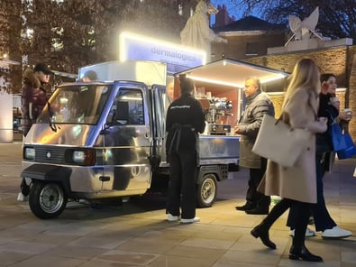 Dermalogica talks to the public with a chrome Piaggio Ape.