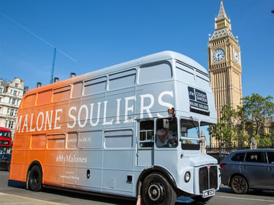 The Malone Souliers London Routemaster bus, near Big Ben.