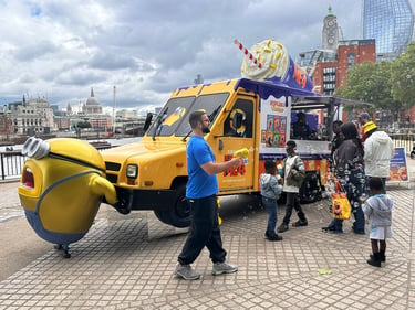 2024 Despicable me Utilimaster, with a 3D minion and small crowd