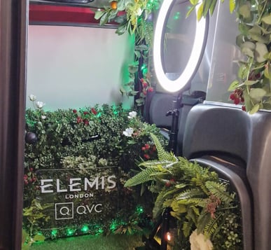 Inside the Elemis and QVC taxi rental, with a light ring for photo ops.