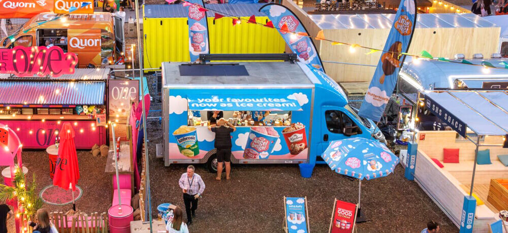 Premier Foods exhibition van on location in a theme park