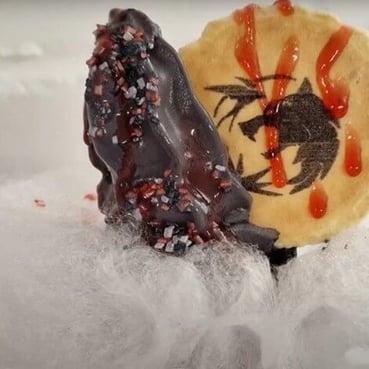 The Witcher ice cream, with a black Mr. Whippy and a Geralt medallion