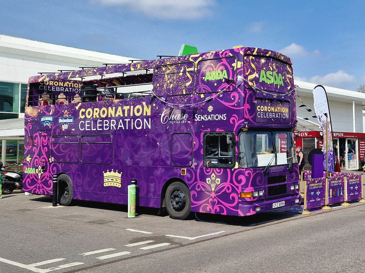 A purple bus used for The Complete Guide to Double-Decker Bus Hire.